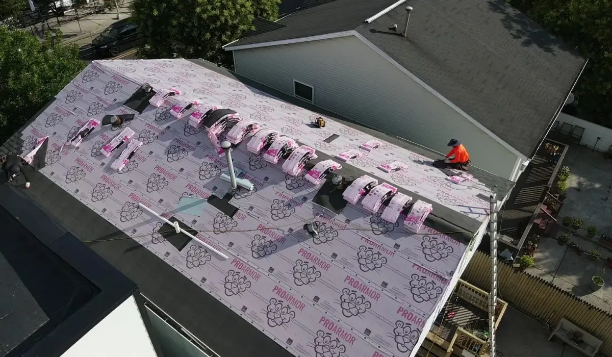 A full roof tear-off and replacement underway on a New Jersey home, the scope of work that requires a construction permit