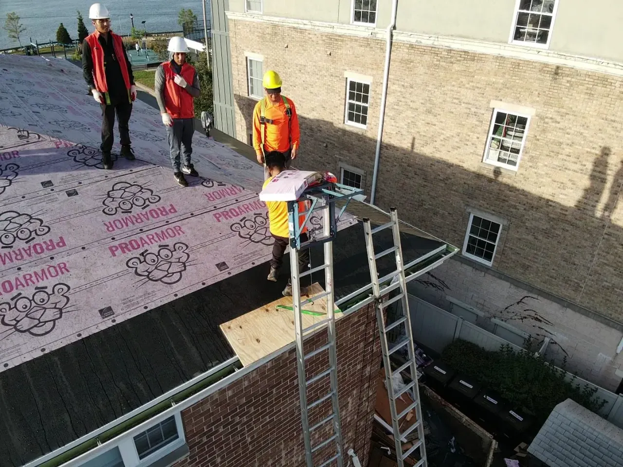 Englewood Roofing crew member on a jobsite